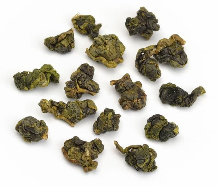 Alishan High Mountain Oolong tea leaves tightly rolled into balls